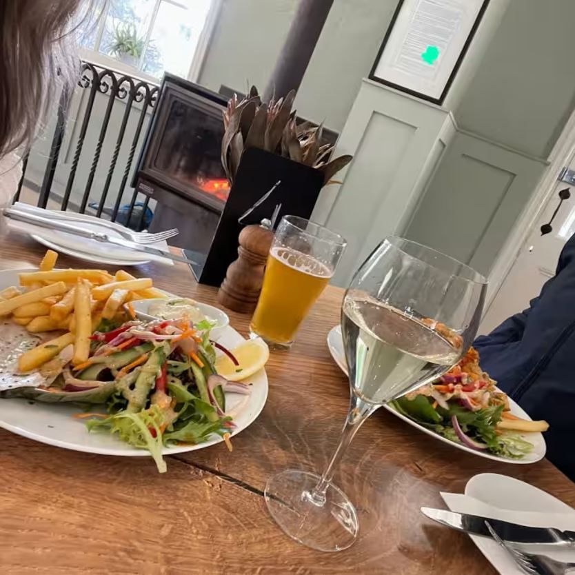 Lunch by the fire inside the Greenman Inn